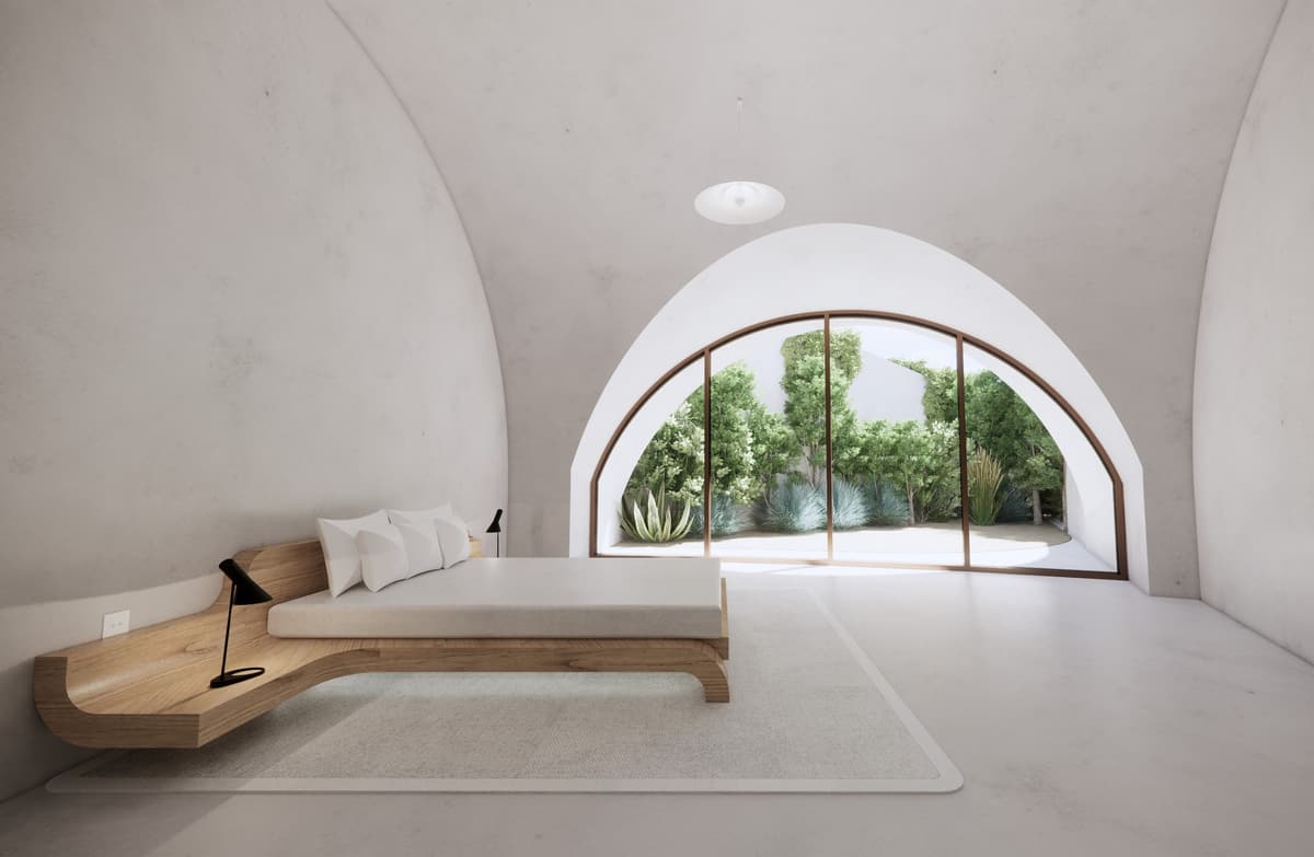 3D rendering of a vaulted bedroom with a curved wooden bed and an arched window onto a planted patio