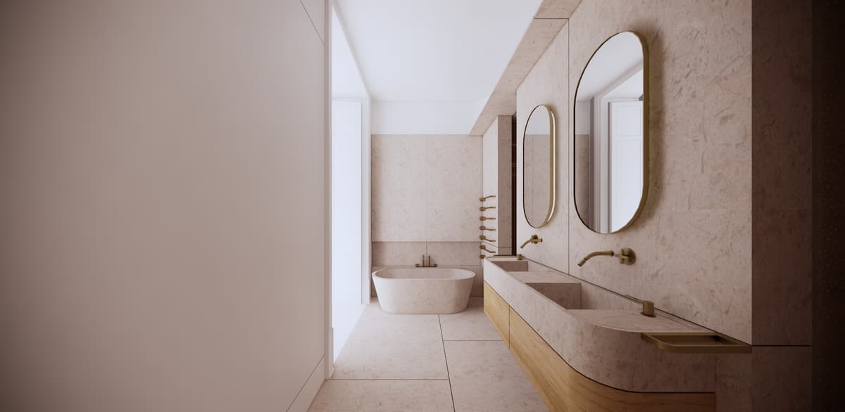 Rendering of a stone-clad bathroom with freestanding tub, double stone basin, brass taps and oval mirrors