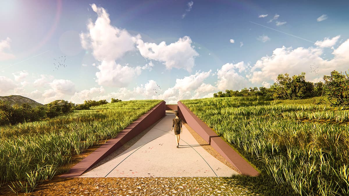Rendering of a visitor walking down a ramp between earth-toned walls cut into a grassy hillside